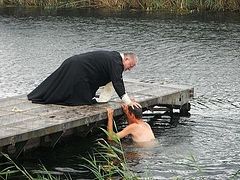 300 Russian servicemen receive Baptism in the field