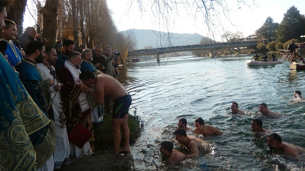 Trebinje. Participants in the swim recieve a blessing from Bishop Gregorije of Zahumlje and Herzegovina.