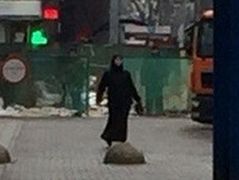 Woman in black holding severed child's head near Moscow metro station detained (GRAPHIC)