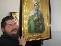 Image of St. Matrona appears on church wall