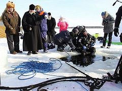 Yaroslavl Diocese exploring South Dorothea Hermitage under frozen reservoir