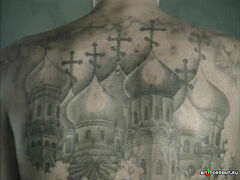 Православные активисты возмутились рисунками тату-мастера с куполами и котами