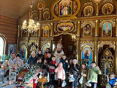 Mass Baptism of refugee children in western Ukrainian church