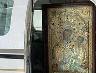 With The Tikhvin Icon Over Chicago and Michigan
