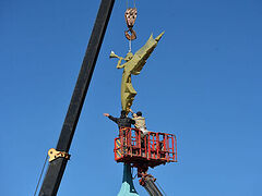 Optina crowned with reconstructed monastery symbol—trumpeting angel