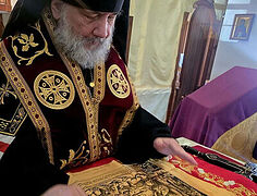 Archbishop Daniel places antimensions on altar at St. Paul’s Monastery in Wisconsin