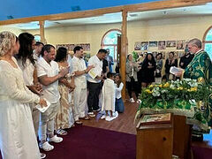Eight received into the Church at NY parish
