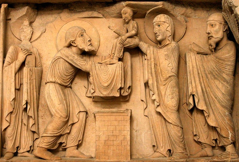 Сретение Господне, XII век. Часть тимпана западного фасада в Ла-Шарите-Сюр-Луар, Бургундия, Франция